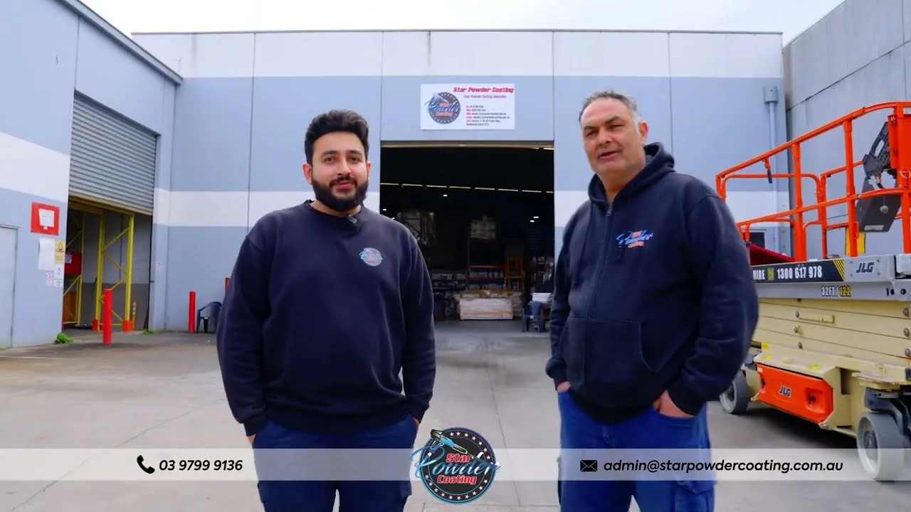 Star Powder Coating team standing outside the open roller door of the Dandenong South workshop, Factory 2 Cyber Loop